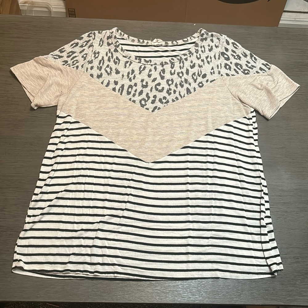 White and black short sleeve shirt